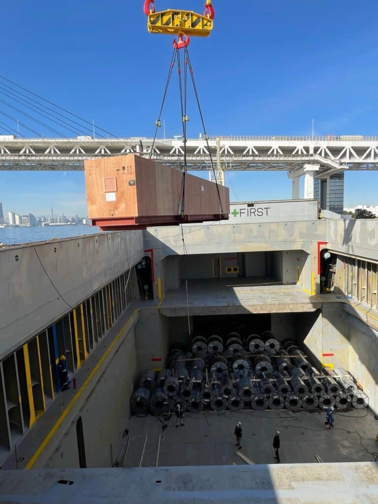 70‑tonne generator turbine secured on barge at Toshiba Jetty in Japan during heavy‑lift preparation by Broekman Logistics India